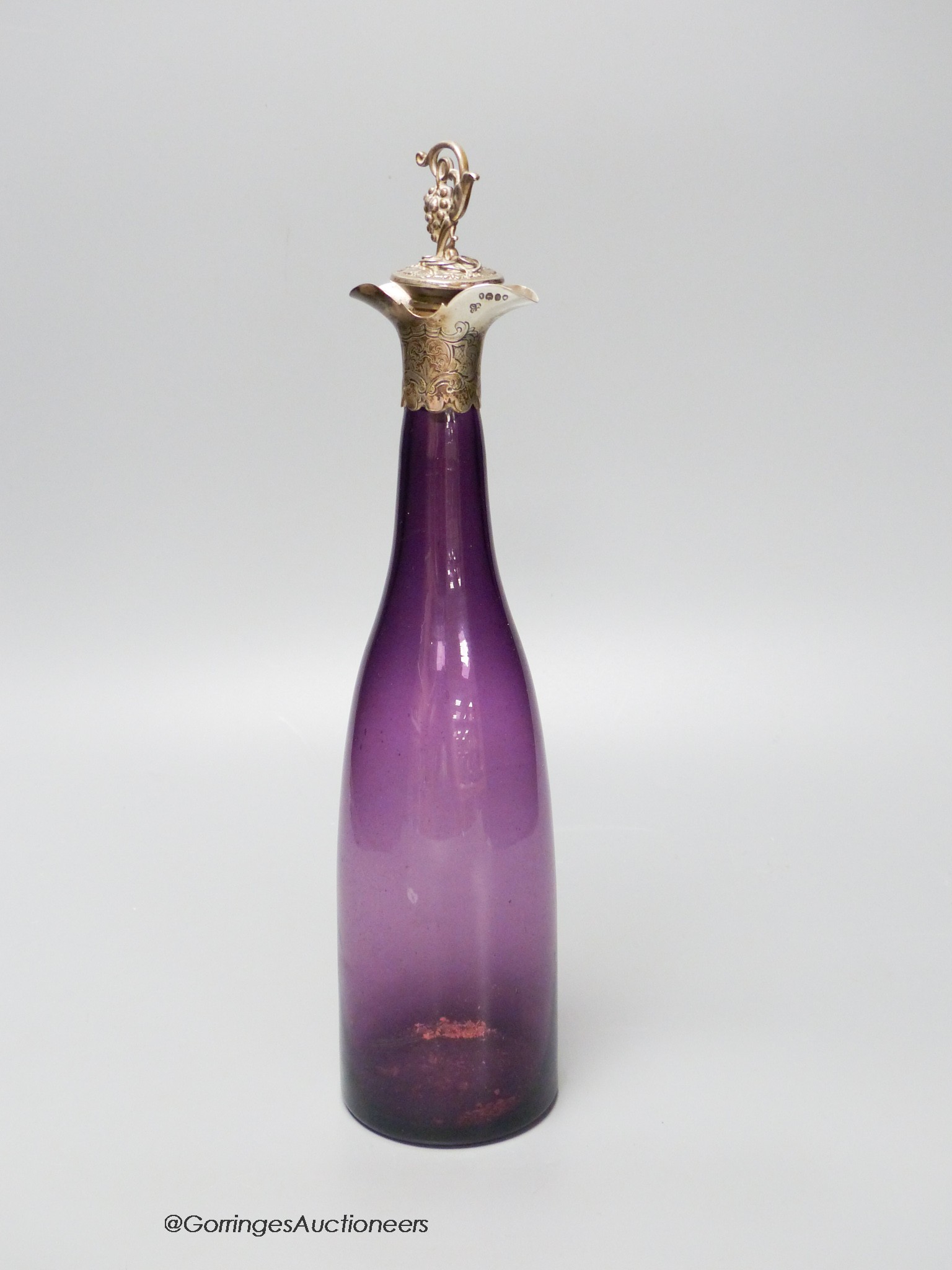 A Victorian silver mounted amethyst glass decanter, height 31cm